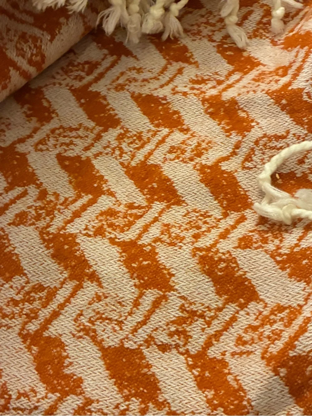 Threshold soft woven throw with knotted tassels. 60”x50”.